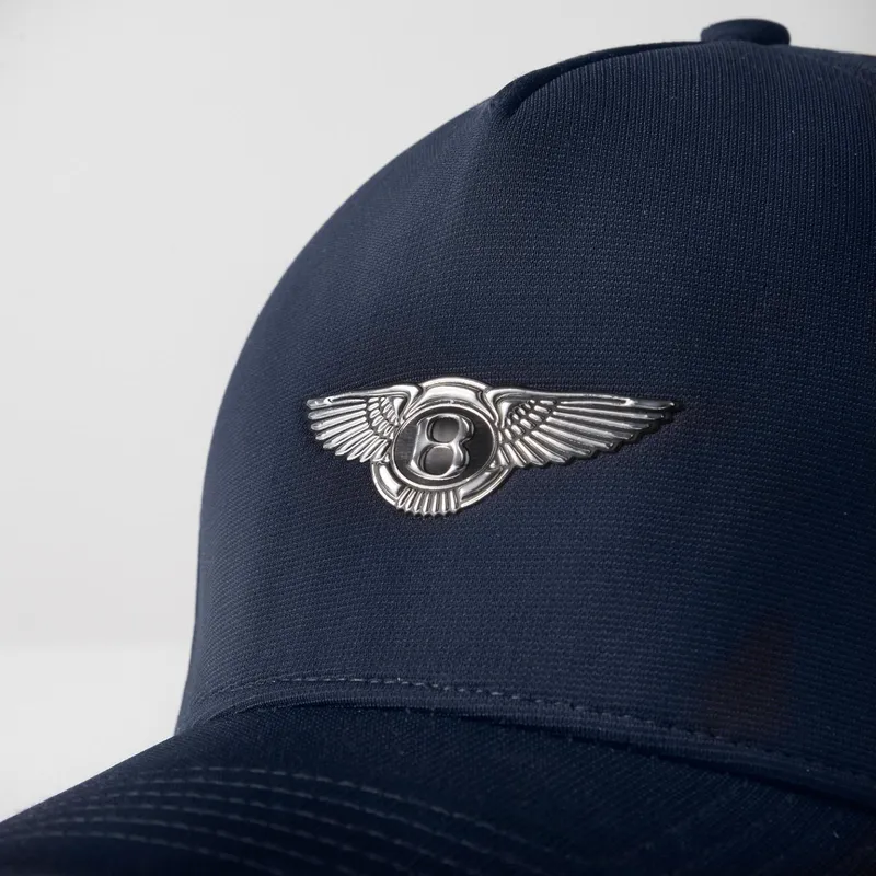 petten-gebogen-marineblauw-fitted-b7cn-golf-van-bentley