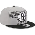 casquette-plate-grise-et-noire-snapback-9fifty-draft-edition-2023-brooklyn-nets-nba-new-era