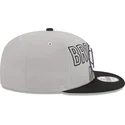 casquette-plate-grise-et-noire-snapback-9fifty-draft-edition-2023-brooklyn-nets-nba-new-era