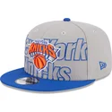 casquette-plate-grise-et-bleue-snapback-9fifty-draft-edition-2023-new-york-knicks-nba-new-era