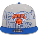 casquette-plate-grise-et-bleue-snapback-9fifty-draft-edition-2023-new-york-knicks-nba-new-era