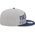 casquette-plate-grise-et-bleue-marine-snapback-9fifty-draft-edition-2023-memphis-grizzlies-nba-new-era