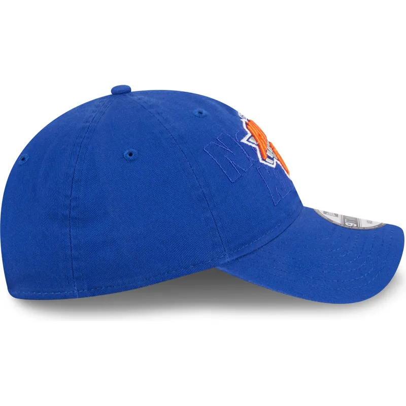 petten-gebogen-blauw-verstelbaar-9twenty-draft-edition-2023-van-new-york-knicks-nba-van-new-era