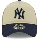 new-era-9forty-a-frame-all-day-trucker-new-york-yankees-mlb-beige-and-navy-blue-trucker-hat