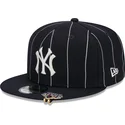 casquette-plate-bleue-marine-snapback-9fifty-pinstripe-visor-clip-new-york-yankees-mlb-new-era