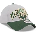 casquette-courbee-grise-et-verte-ajustable-9twenty-tip-off-2023-milwaukee-bucks-nba-new-era