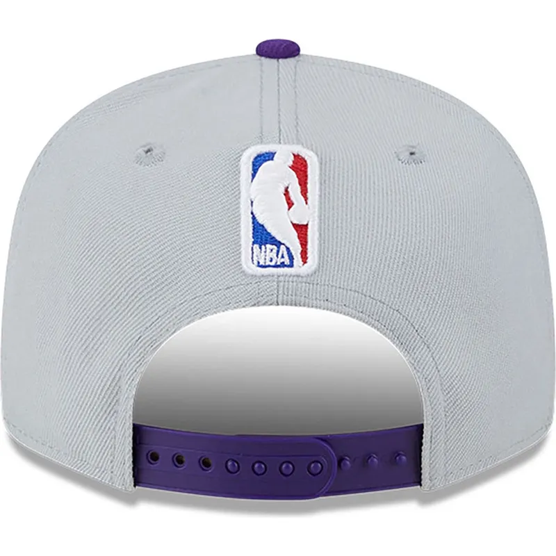 petten-plat-grijs-snapback-9fifty-tip-off-2023-van-los-angeles-lakers-nba-van-new-era