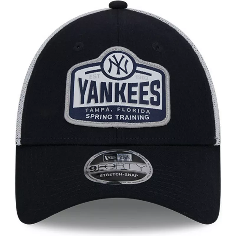 https://static.caphunters.com/40493-large_default/new-era-9forty-stretch-snap-tab-new-york-yankees-mlb-navy-blue-and-white-trucker-hat.webp