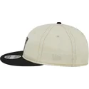 casquette-plate-beige-et-noire-ajustable-9fifty-retro-crown-denim-oakland-raiders-nfl-new-era