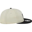 casquette-plate-beige-et-noire-ajustable-9fifty-retro-crown-denim-oakland-raiders-nfl-new-era