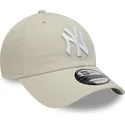 beige-verstellbare-curved-cap-9twenty-league-essential-der-new-york-yankees-mlb-von-new-era