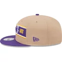 new-era-flat-brim-9fifty-draft-2024-los-angeles-lakers-nba-brown-and-purple-snapback-cap