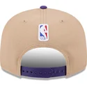 casquette-plate-marron-et-violette-snapback-9fifty-draft-2024-los-angeles-lakers-nba-new-era