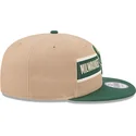 casquette-plate-marron-et-verte-snapback-9fifty-draft-2024-milwaukee-bucks-nba-new-era