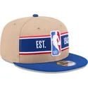 gorra-plana-marron-y-azul-snapback-9fifty-draft-2024-de-nba-de-new-era