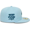 gorra-plana-azul-claro-ajustada-59fifty-anniversary-script-de-new-era