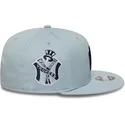 berretto-piatto-snapback-blu-con-logo-blu-marino-9fifty-original-fit-world-series-dei-new-york-yankees-mlb-di-new-era