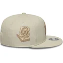 cappellino-piatto-beige-snapback-con-logo-beige-9fifty-original-fit-world-series-dei-new-york-yankees-mlb-di-new-era
