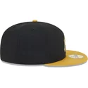 gorra-plana-negra-y-amarilla-ajustada-con-logo-dorado-59fifty-day-de-new-york-yankees-mlb-de-new-era