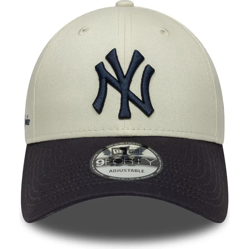 bojd-beige-och-marinbla-justerbar-keps-9forty-side-script-new-york-yankees-mlb-fran-new-era