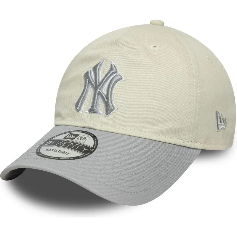 beige-og-gra-justerbar-kvindekasket-med-buet-skygge-9twenty-world-series-cooperstown-af-new-york-yankees-mlb-fra-new-era