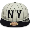 verstellbare-beige-und-marineblaue-flache-kappe-9fifty-retro-crown-heritage-der-new-york-yankees-mlb-von-new-era