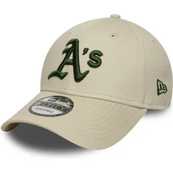 Beżowa zakrzywiona czapka regulowana z zielonym logo 9FORTY League Essential Oakland Athletics MLB od New Era
