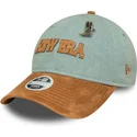 regulowana-damska-czapka-z-daszkiem-w-kolorze-niebieskim-i-brazowym-9twenty-western-pin-marki-new-era