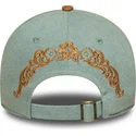 regulowana-damska-czapka-z-daszkiem-w-kolorze-niebieskim-i-brazowym-9twenty-western-pin-marki-new-era