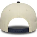 new-era-curved-brim-9forty-e-frame-world-series-patch-new-york-yankees-mlb-beige-and-navy-blue-snapback-cap