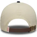 casquette-courbee-beige-et-bleue-marine-ajustable-9forty-e-frame-patch-suede-new-era