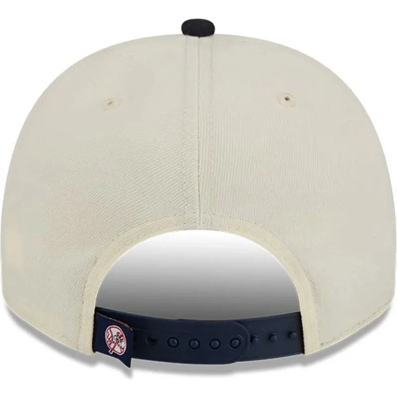 cappellino-curvo-beige-e-blu-marino-snapback-9fifty-a-frame-classic-di-new-york-yankees-mlb-di-new-era