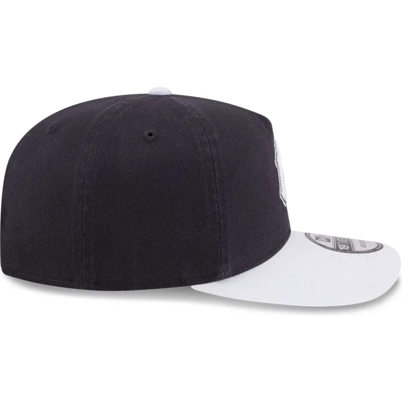 petten-gebogen-marineblauw-snapback-19twenty-spring-training-van-new-york-yankees-mlb-van-new-era
