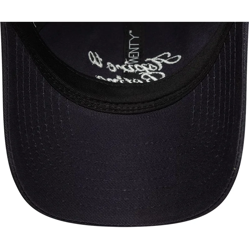 marineblaue-gebogene-verstellbare-damenkappe-9twenty-aspire-to-retire-slogan-von-new-era