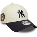 cappellino-curvo-beige-e-blu-navy-regolabile-con-logo-blu-navy-9forty-world-series-dei-new-york-yankees-mlb-di-new-era