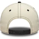 cappellino-curvo-beige-e-nero-snapback-e-frame-city-icon-dei-los-angeles-lakers-nba-di-new-era