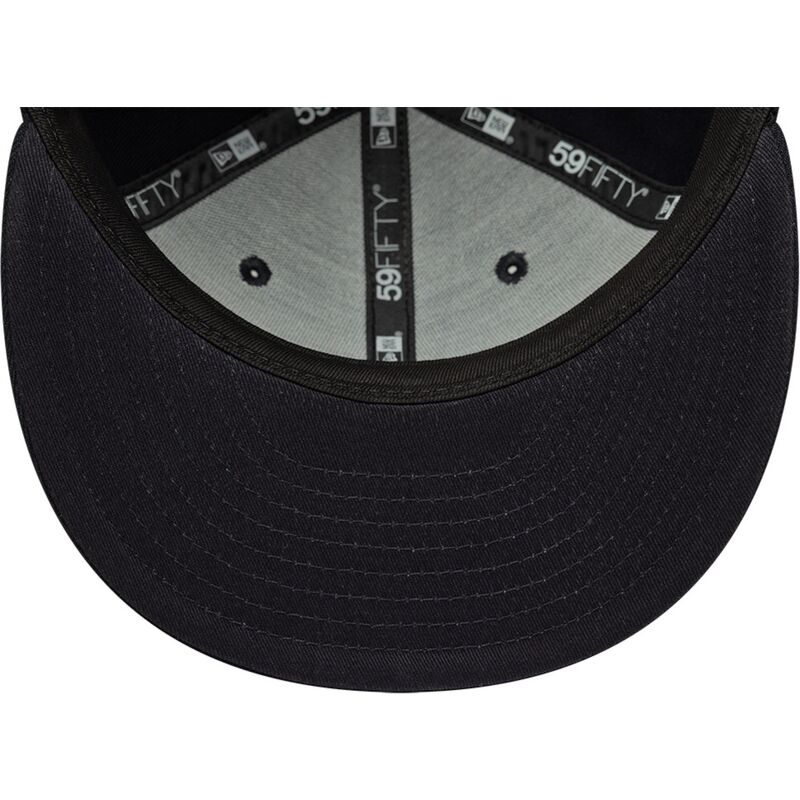 petten-plat-marineblauw-aangepast-59fifty-oval-patch-van-new-era