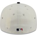 gorra-curva-beige-y-azul-marino-ajustada-59fifty-beads-na-lifestyle-f1-de-atlanta-braves-mlb-de-new-era