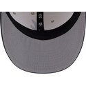 gorra-curva-beige-y-azul-marino-ajustada-59fifty-beads-na-lifestyle-f1-de-atlanta-braves-mlb-de-new-era