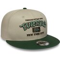 gorra-plana-verde-y-beige-snapback-para-nino-9fifty-de-tortugas-ninja-de-new-era